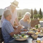 friends in retirement at dinner together